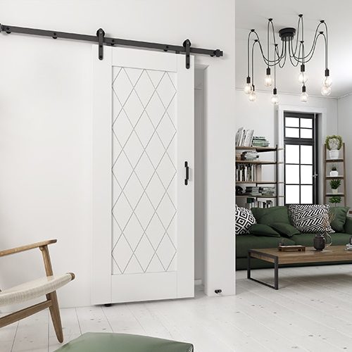 białe drzwi przesuwne w pokoju